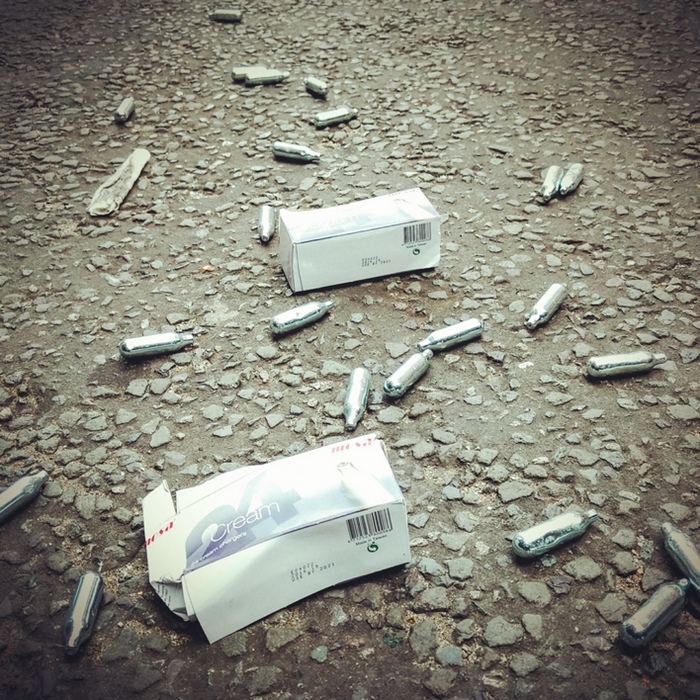 empty box and empty laughing gas canisters in London