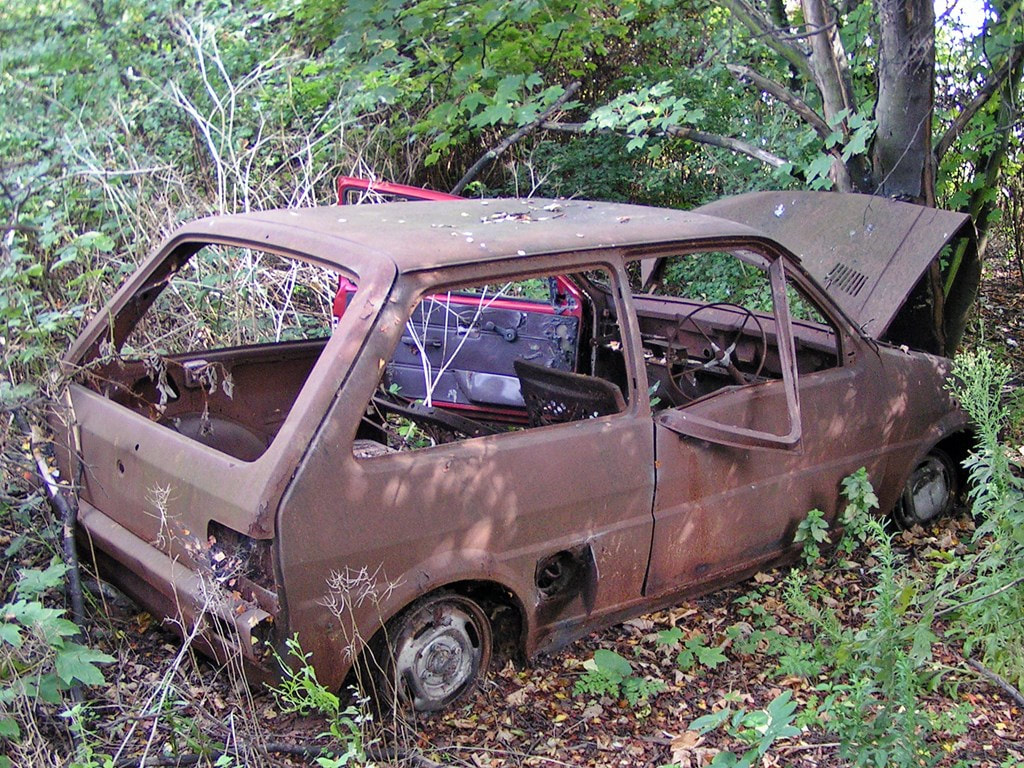 Abandoned burnt out stolen Austin Mini Metrro