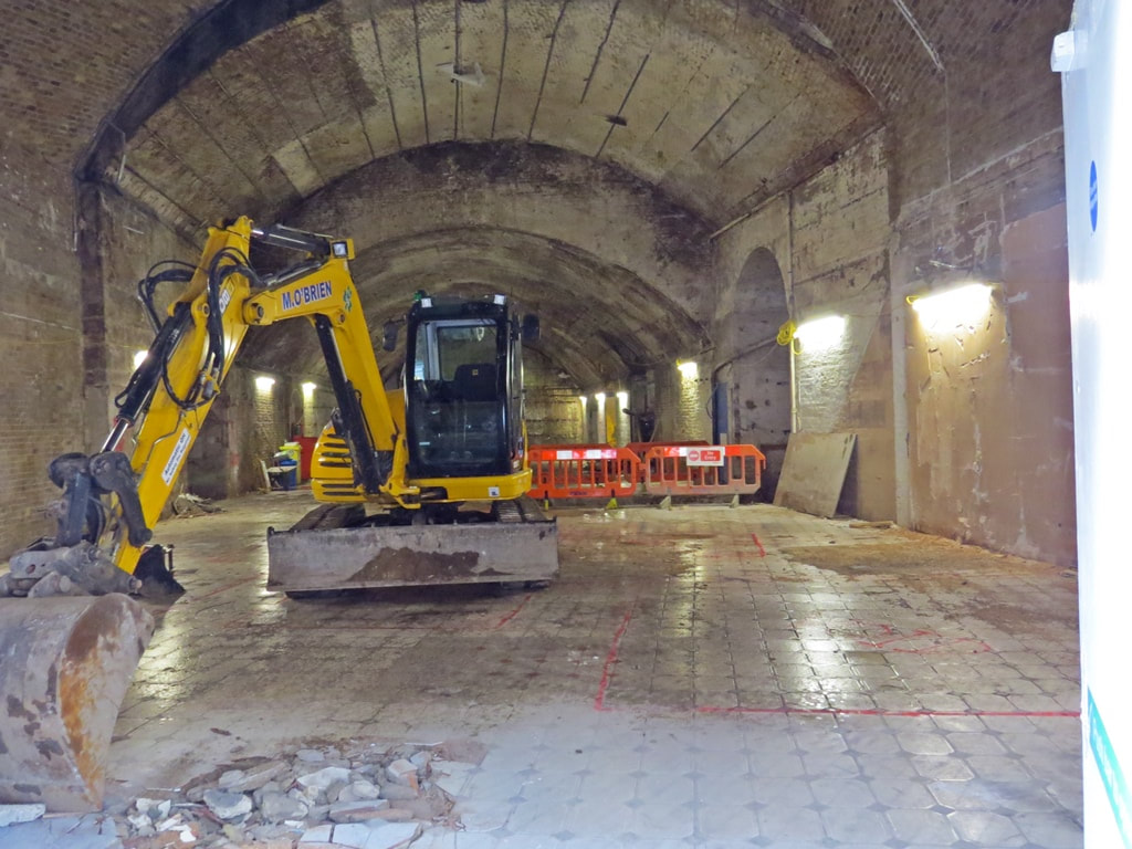 JCB at
London Bridge Station, Tooley Street arches during rebuilding of the station
