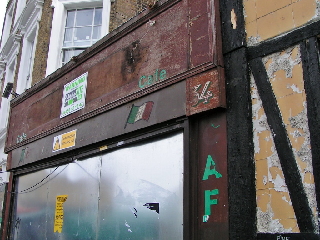 Steel shuttered defunct Franscesca’s Café on Broadway Market near London Fields