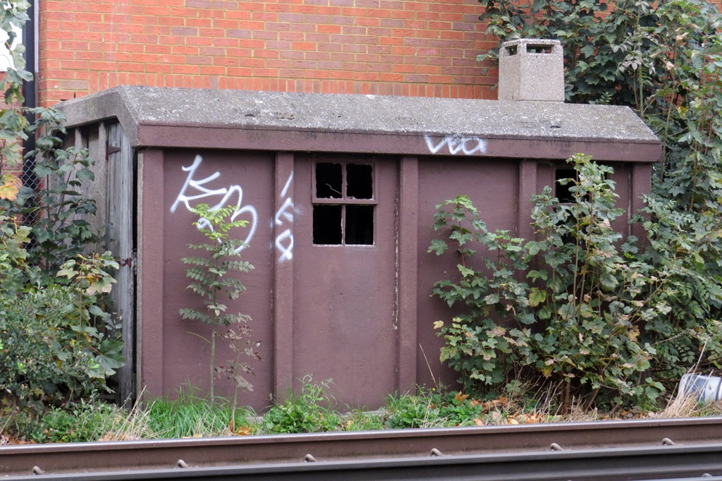Derelict railway workers hut by the track in Mortlake, Southwest London.