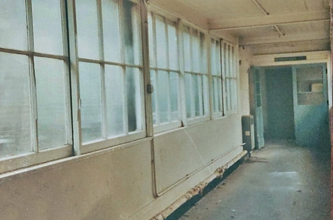 Derelict corridor inside  New End Hospital, Hampstead 
