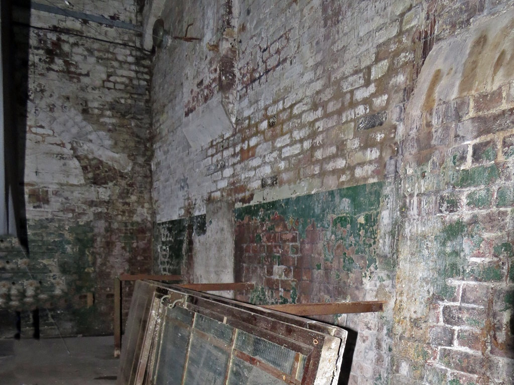 Interior photograph of derelict New River Head coal stores building