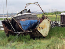 Picture of redundant decaying boats in graveyard on the River Thames in Swanscombe,Kent near Gravesend