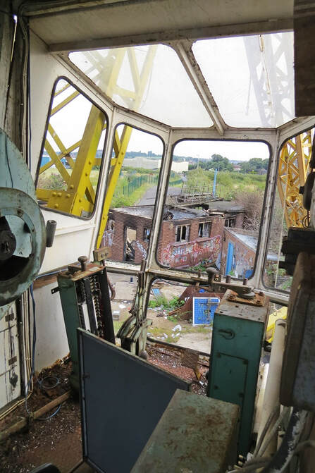 Abandoned Scotch Derrick crane overlooking derelict Acorn Shipyard in Rochester Kent
