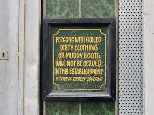 Persons with dirty clothing or muddy boots will not be served