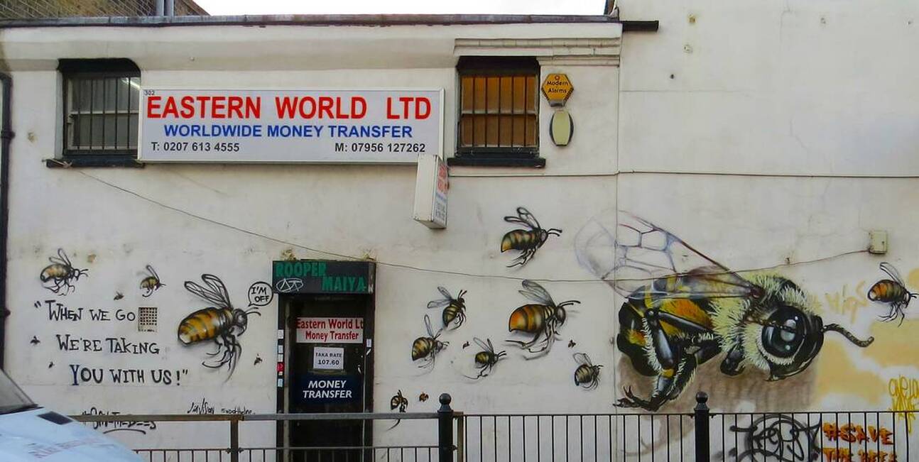 save the bees honey bee graffiti street art in Bethnal Green, East London, E2
