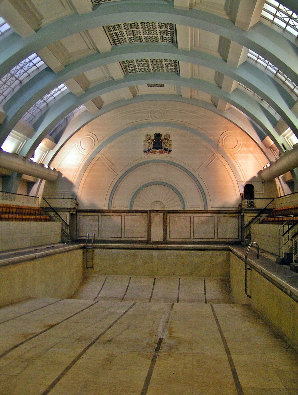 The main pool of Marshall Street Baths is lined with white Sicilian marble and this marble and Swedish green marble are used on the walls at either end.