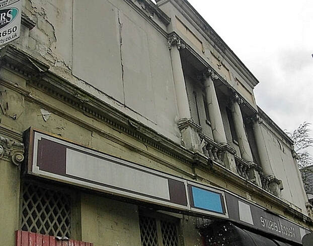 ​The derelict Empress Cinema in Hoe Street near the junction with the Bakers Arms in Walthamstow in 2003 