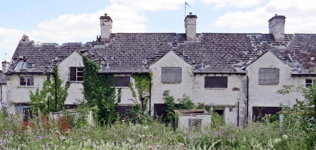 Abandoned derelict housing at RAF Uxbridge in St Andrews Park in London Borough of Hillingdon