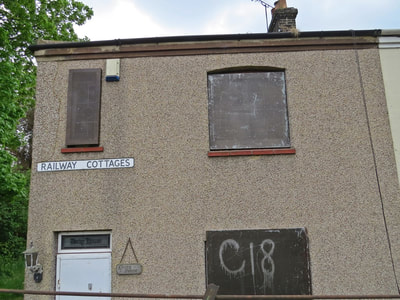 Combat 18 graffiti on empty house in Purfleet, Essex