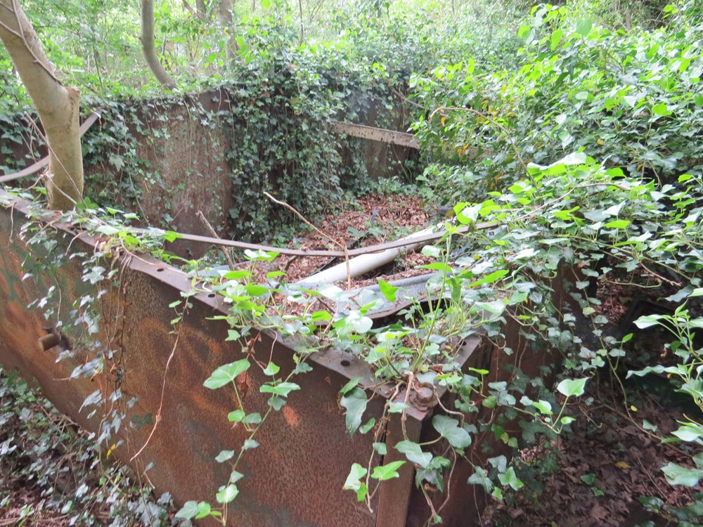 abandoned overgrown water tank near Ruislip Lido