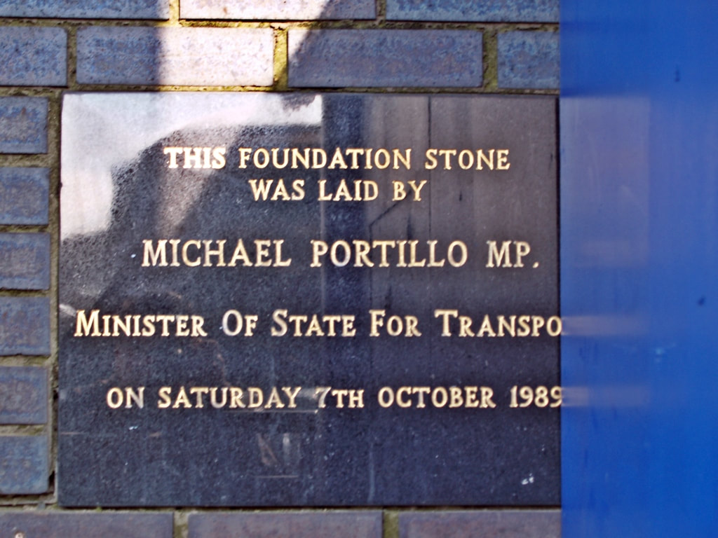 Plaque at Silvertown station saying this foundation stone was laid by Michael Portillo MP Minister of State for Transport on Saturday 7th October 1989