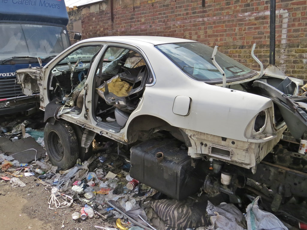 derelict scrap vehicle in Poplar, East London