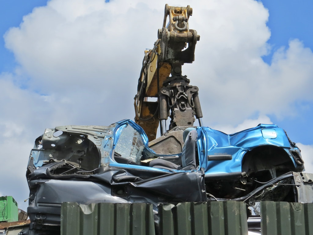 crushed car in East London scrapyard vehicle salvage 