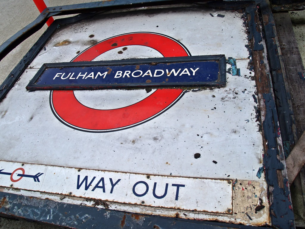 Discarded Fulham Broadway tube station sign at  London Transport Museum Depot at Acton 