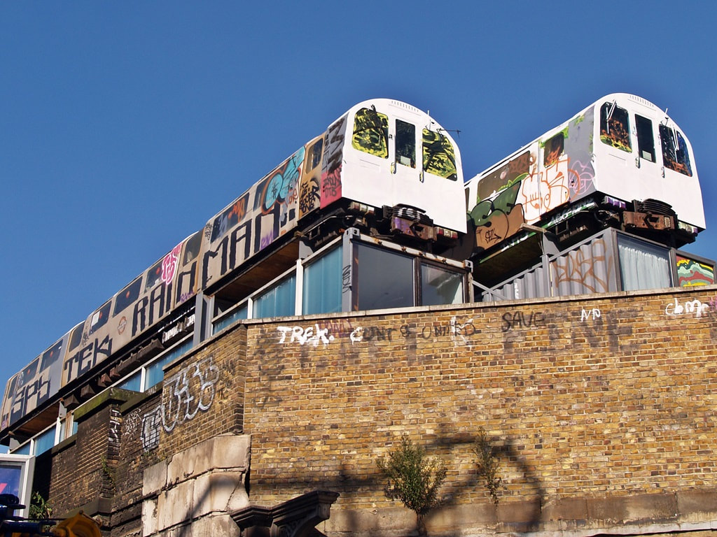 Redundant tube trains on disused railway viaduct in East London