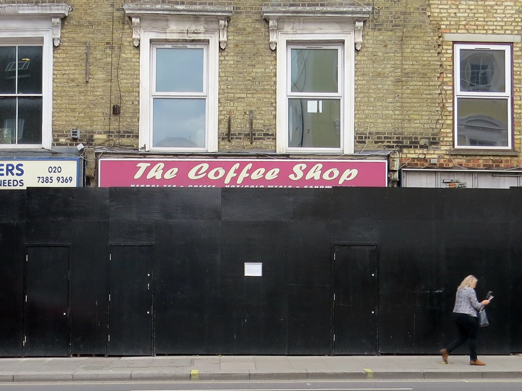 Boarded up premises of The Coffee Shop in West Brompton, SW6