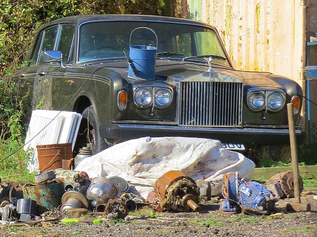 Picture of decaying Rolls Royce on waste site in Walton-on-the-Naze