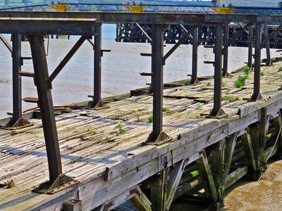 Derelict abandoned pier or jetty at Purfleet on the Thames Estuary in Essex