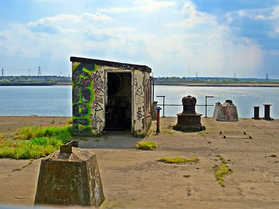 Derelict concrete hut by the River Thames in Purfleet