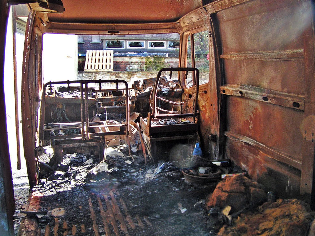 Burnt out interior of transit van in Tower Hamlets