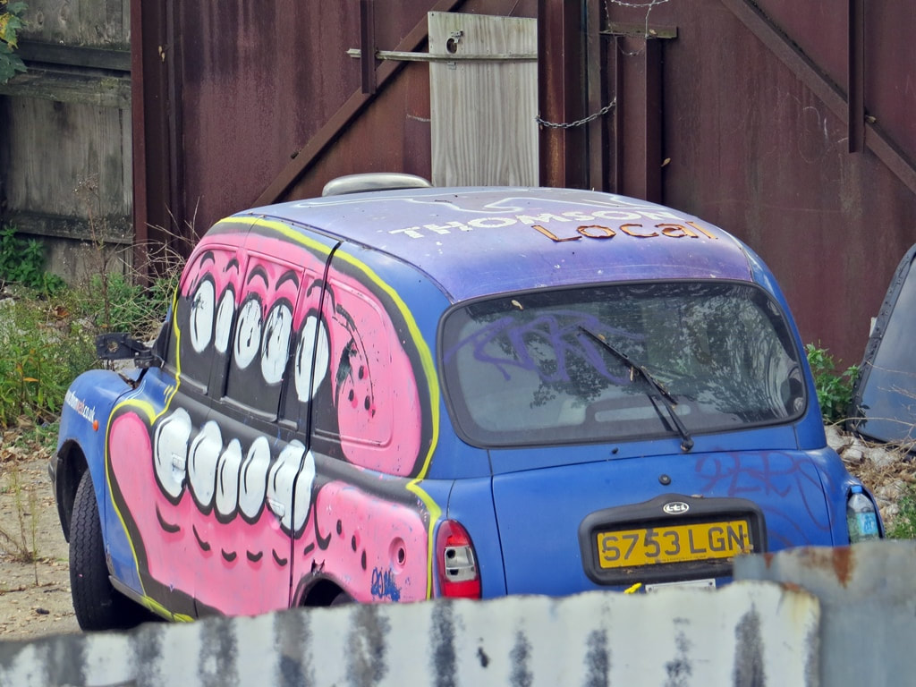 London Taxi with Sweet Tooth streetart graffiti 